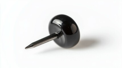 Isolated black pushpin on white background