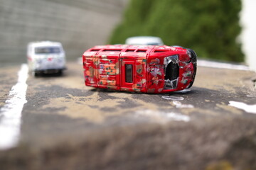 traffic accident. broken car. flipped car. Accident with two white broken cars. An overturn car...