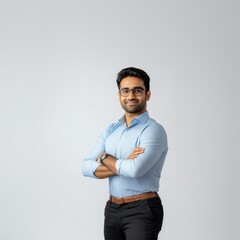 young indian businessman standing on isolated background