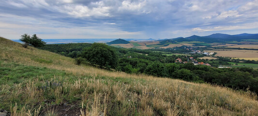 Fototapeta premium View of the landscape of the Bohemian Central Highlands from Holý vrch mountain. There is a great view in all directions from here.
