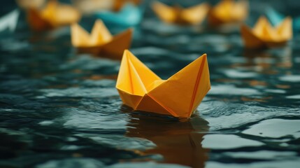 A bright yellow paper boat moving in a different direction amidst a fleet of paper boats on still water