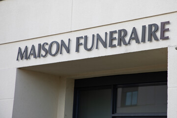 maison funeraire french text means  funeral home shop facade mortician undertaker