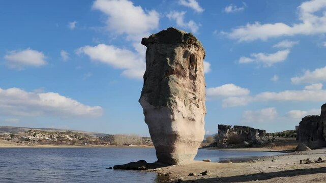 Magical rock formation by the side of the Lake Emre which is a serene natural oasis, surrounded by lush greenery and ancient rock formations in the heart of Phrygian Valley in Afyonkarahisar.