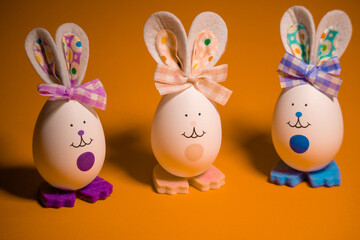 Easter eggs. funny hares. toy rabbit. toy egg. statuette easter bunny.