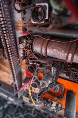 Close-Up of Rusty Industrial Machinery with Wires and Components Highlighting Vintage Mechanical Engineering
