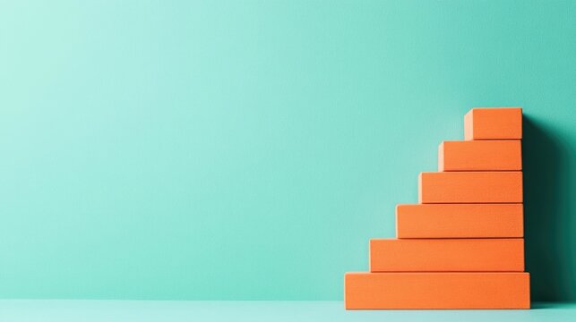 Abstract of a geometric orange staircase against a minimalist green backdrop representing the personal growth journey towards visionary goals and career advancement