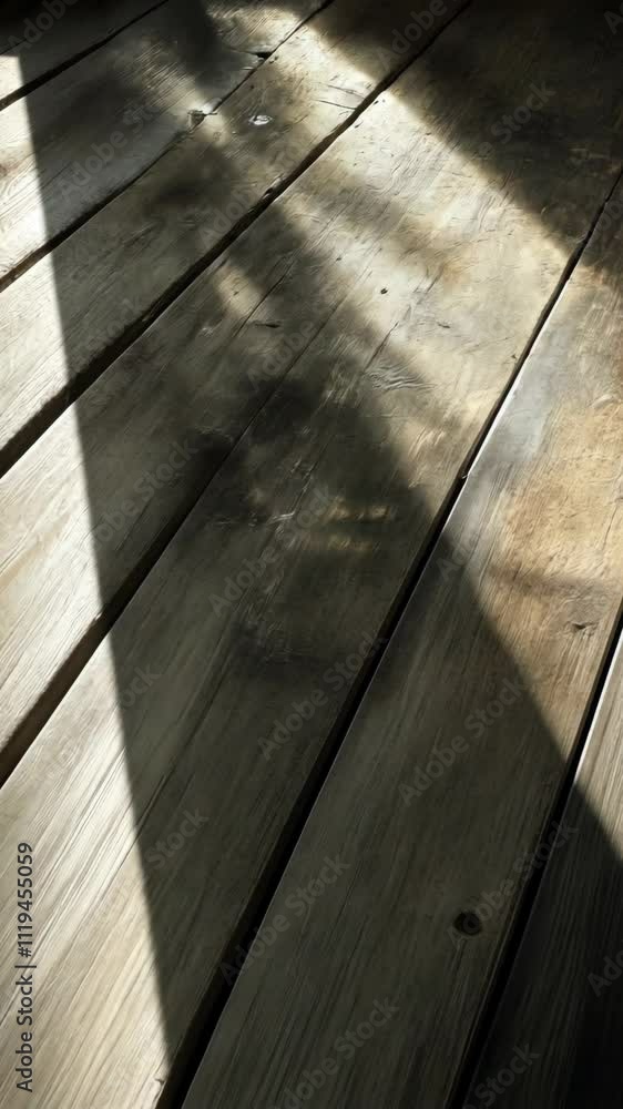 Aufkleber light and shadow interplay on wooden floor creates a mesmerizing abstract pattern in a quiet interio