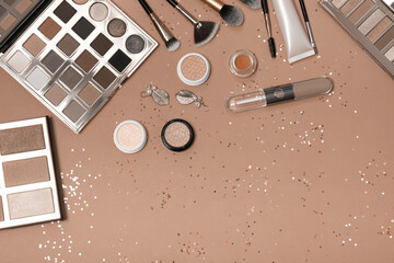 Flat lay of Makeup cosmetic product on background. New trending colour of the 2025 year 

