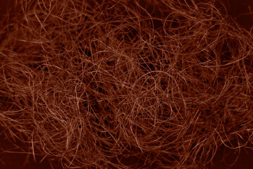 fiber on a black background. Background, structure. Color of the Year Mocha Mousse.