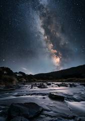 Obraz premium Stunning night sky with the Milky Way stretching across a starry backdrop. Ideal for nature and astronomy themes.