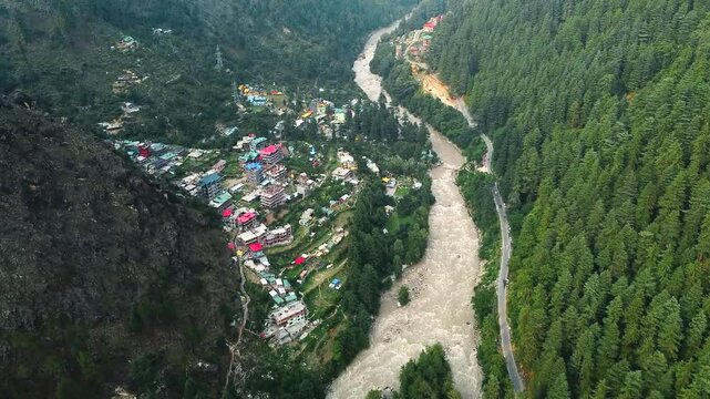 Aerial view of himalayan mountains at kasol himachal pradesh. Small villages and colorful local houses nested in the hills of parvati valley at kasol, himachal pradesh, India.