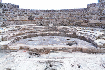Apsidal section of the Church of the Apocalypse in Laodicea, featuring ancient stonework and...