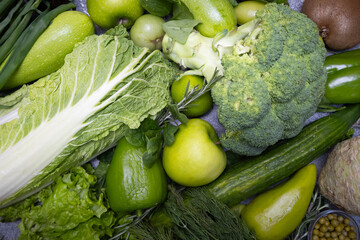 Various green fresh veggies background
