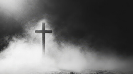 Cross in foggy landscape with dramatic lighting and dark atmosphere