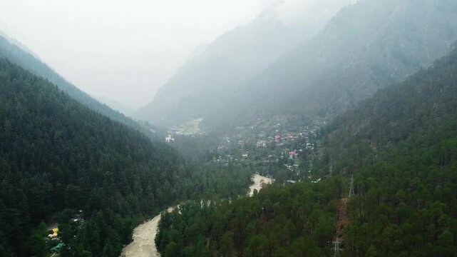 Aerial view of himalayan mountains at kasol himachal pradesh. Small villages and colorful local houses nested in the hills of parvati valley at kasol, himachal pradesh, India.