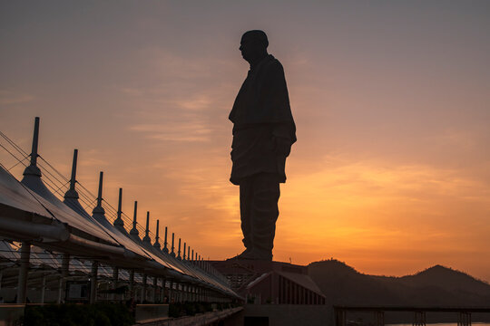 silhouette of a person at sunset Statue of Unity
