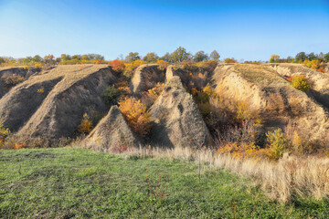 Autumn landscape with big ravine. Country life