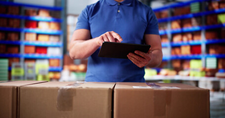Delivery Man Worker Using Tablet