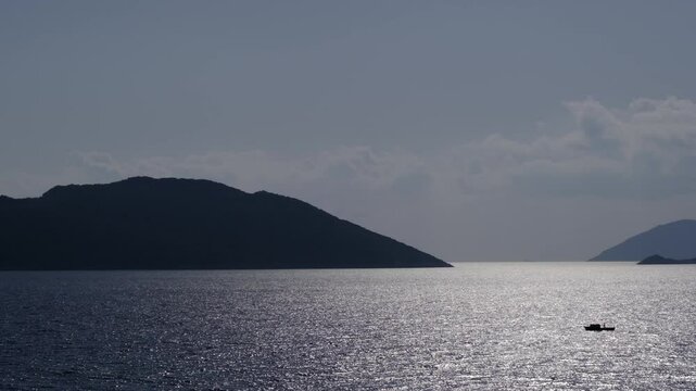 view from the coast near the town of Kas to the islands and boats in the open sea. Turkish resort on Mediterranean sea