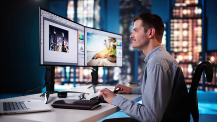 Graphic Designer Working On Computer Editing