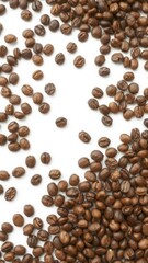 Obraz premium Close-up shot of freshly roasted coffee beans spread out on a clean white background, background, light