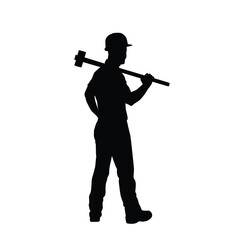 Fototapeta premium Silhouette of a worker carrying a hammer