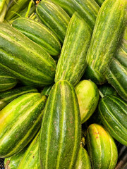 Green zucchini background . Close up food