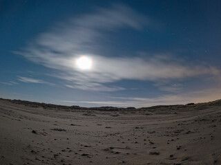 Wonderful seascape with golden beach at night. Dutch archipelago at the North Sea in summer time