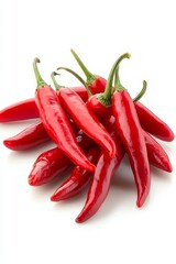 Pile of Fresh Red Chili Peppers on Bright Pink Background.