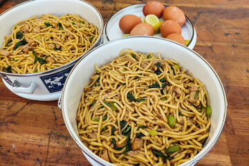 Large Portion of Dried Noodles and Eggs in a Bowl