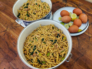 Large Portion of Dried Noodles and Eggs in a Bowl