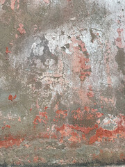 Textured plaster wall surface with peeling paint in various shades. Texture of the wall for background. Abstract colorful cement wall.  Wallpaper, backdrop, design