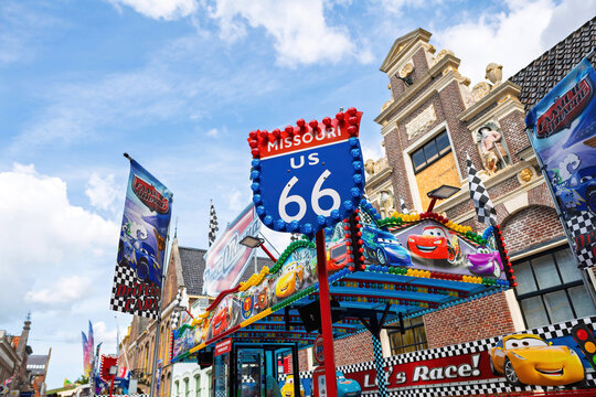 Alkmaar, Netherlands - Aug 30, 2024: Route 66-themed carnival ride with vibrant Cars movie characters, blending American culture with local festivities in Alkmaar