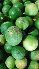 Fresh Green Limes in a Pile