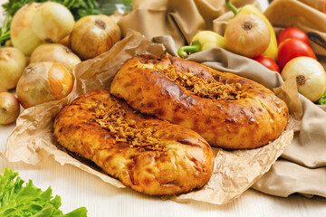 Handmade tandoor bread with fried onions.