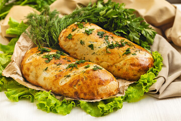 Handmade tandoor bread with parsley.