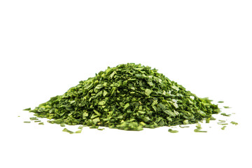 Pile of dried parsley flakes forming small mound on transparent background