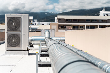 Large industrial air conditioning system on the roof of building
