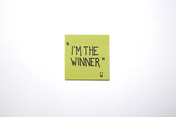 Motivational and love message on a sticky notes with isolated white background.