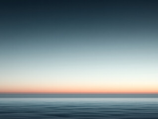 Fototapeta premium Serene ocean view at twilight, showcasing tranquil waters and a colorful horizon.