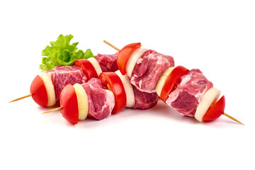 Raw pork kebab with onion and tomatoes, ready to cook, BBQ, isolated on white background.