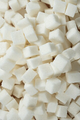 Cubes of white crystalline beetroot refined sugar.