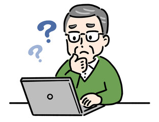 パソコンを見ながら悩む高齢者男性