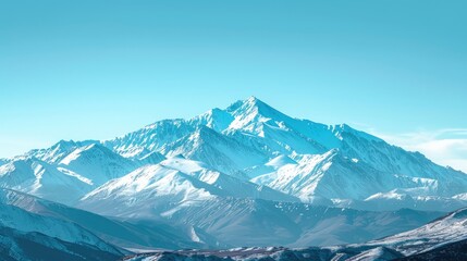 High-end photography of a majestic mountain range covered in snow under a clear blue sky