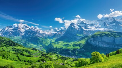 Obraz premium A picturesque view of the Swiss Alps in spring, with snow-capped peaks, lush green valleys, and clear blue skies