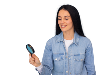 Businesswoman examining a document with a magnifying glass
