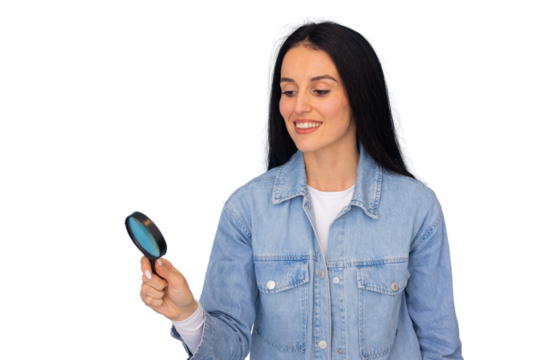 Businesswoman examining a document with a magnifying glass - Powered by Adobe