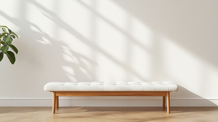 Fototapeta premium A stylish white bench with wooden frame is positioned against light wall, casting soft shadows on floor. minimalist design complements serene atmosphere of room