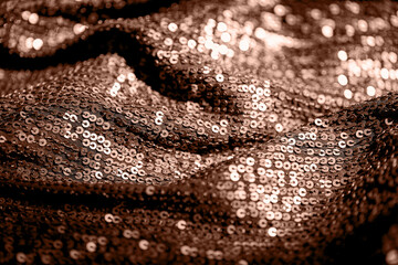 Abstract composition of fabric with shiny sequins. Holiday and party concept. Color of the year 2025 inspired