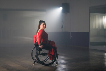 Woman para dancing, spinning, and whirling in the ballroom during training class. Dance and disability concept.